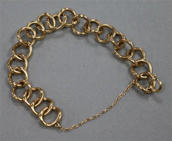 An unmarked yellow metal bracelet,